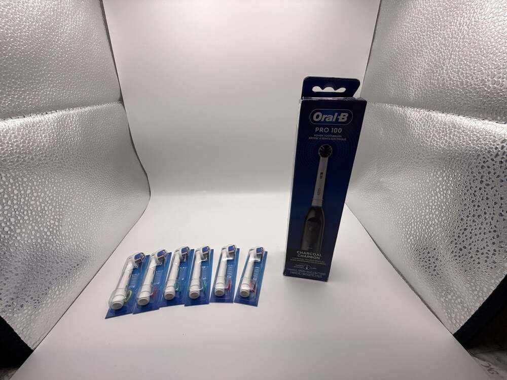 Oral-B Pro 100 Charcoal Power Toothbrush with 6 Replacement Heads